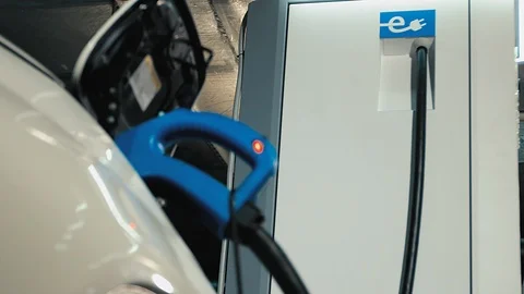 Charging of an electric car Stock Footage 92559457
