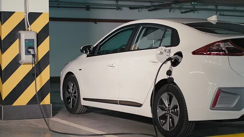 Charging of an electric car Stock Footage 92559651