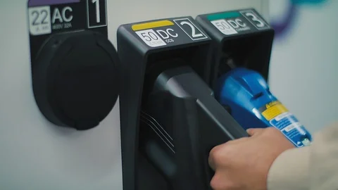 Charging of an electric car Stock Footage 92559943