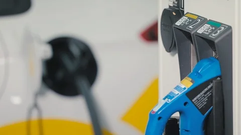 Charging of an electric car Stock Footage 92575642