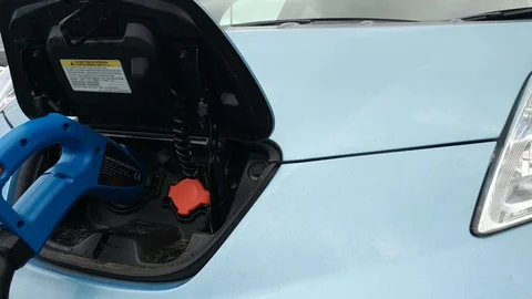 Charging electric car Stock Footage 122821684