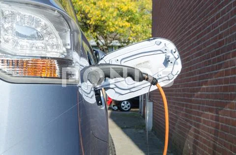 Charging electric car Stock Photos