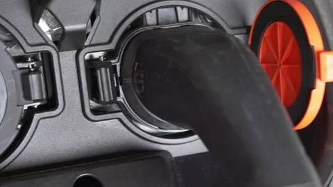 Charging Electric Car With Type 2 Charging Plug Interface Close-Up Video stock 246050687