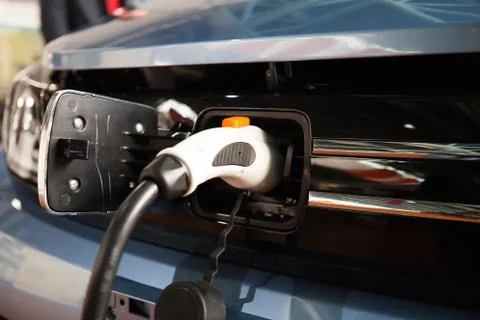 Charging electric vehicles Stock Photos