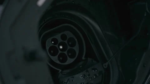 Charging Electrical Car Plug Being Inserted into the Vehicle Power Port Stock Footage 331164446