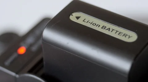Charging lithium ion camera battery Stock-Footage 34667391