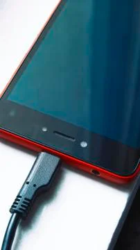 Charging mobile device white Stock Photos