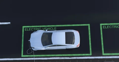 Charging of modern generic electric car on the city street. Video stock 128743536