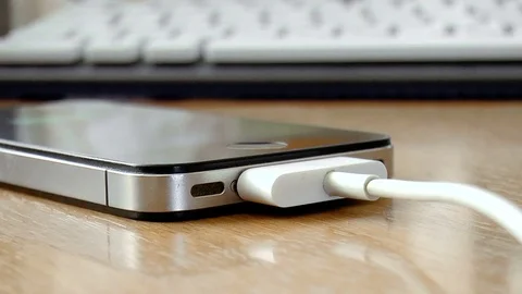 Charging the phone Stock Footage 78911718