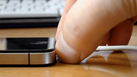 Charging the phone Stock Footage 79099341