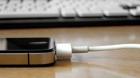 Charging the phone Stock Footage 79230433