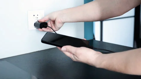 Charging phone Stock Footage 178415392