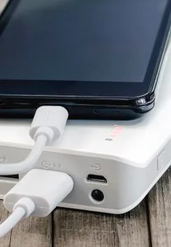 Charging smartphone Stock Photos