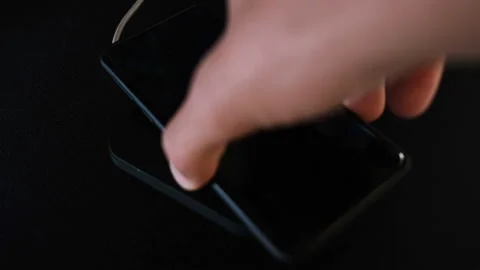 Charging Smartphone Using Wireless Charging Pad,hi technology device 4k Stock Footage 139622274