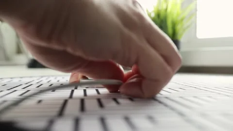 Charging a smartphone, women's hands pull out the charging cable from the p.. Stock Footage 252021304