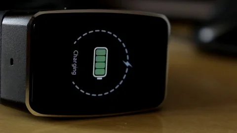 Charging smartwatch Stock Footage 76626765