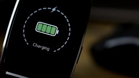 Charging smartwatch Stock Footage 76626802