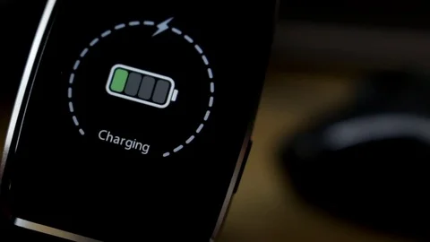 Charging smartwatch Vídeo Stock 76626814