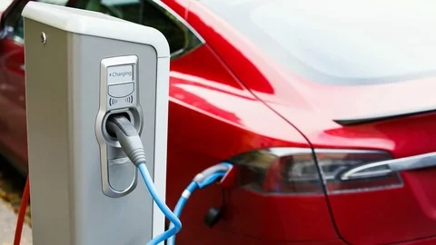 Charging station with electric car Stock Footage 82074580