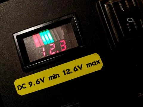 Charging Station Indicator Shows Voltage Level During Testing Process Near .. Stock Photos