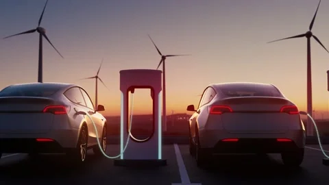 Charging station in sunset light. Charging process. Parking with electric cars Stock Footage 169475554