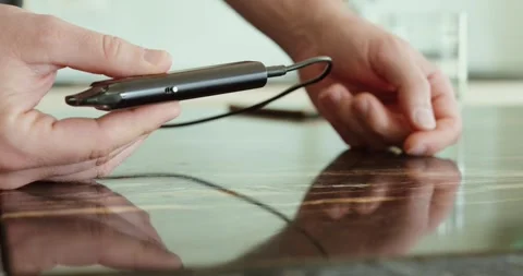 Charging a Vape Device with USB Cable Stock Footage 331948563