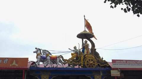 The Charioteer Divine: Krishna Guides Arjun in Battle Stock Footage 313564529