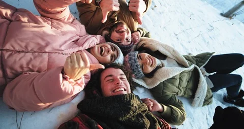 Charismatic and smiling large group of friends enjoying the time together using Stock Footage 112623401