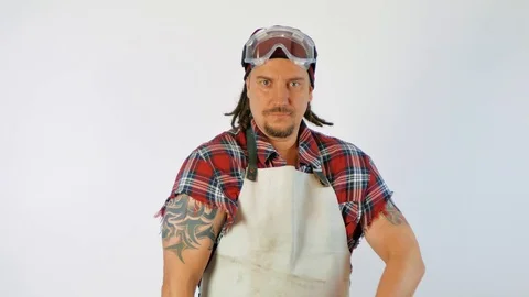 Charismatic bearded construction worker on a white background Stock Footage 105151589
