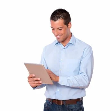 Charismatic guy working with his tablet pc Stock Photos
