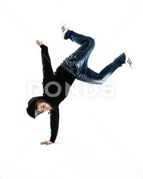 Charismatic rapper performed the dance break.photo on a light ba Stock Photos