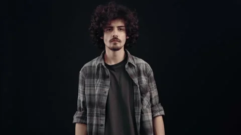 The charismatic young man is looking for someone, when he finds him he shows Stock Footage 152909343