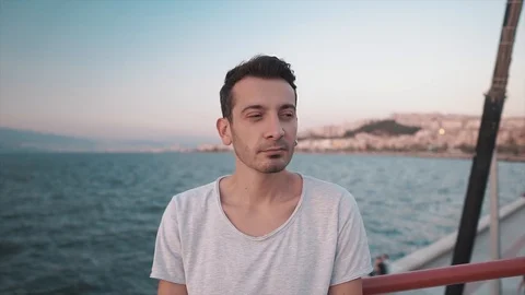 Charismatic young man is winking when he's looking to camera.  Stock Footage 112933729