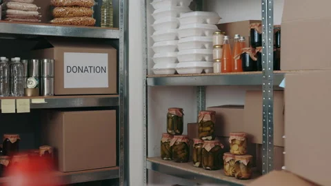 Charitable foundation full of canned and nonperishable food Stock Footage 172192357