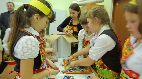 Charity fair, children count bills and coins Stock Footage 44364026