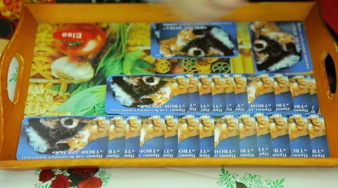 Charity fair, lays out the cards on a tray Stock Footage 44361153