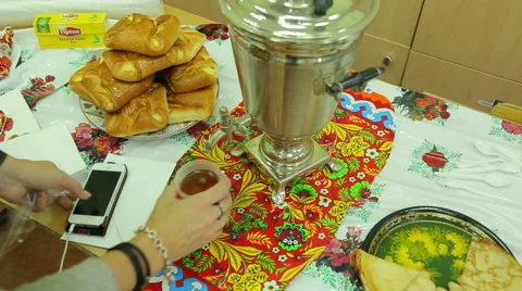 Charity fair, pours tea from a samovar Stock Footage 44360736