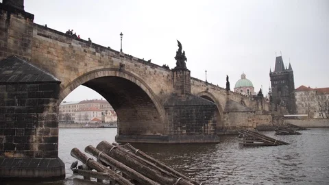 Charles Bridge in the Czech Republic. View from the river. Camera in motion. 4K Stock Footage 107825945