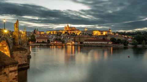 Charles Bridge over the Vltava River in Prague with castle in the background. Stock Photos