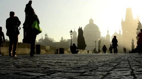 Charles bridge with people walk - sunrise - city - morning mist - buildings Stock-Footage 43200628