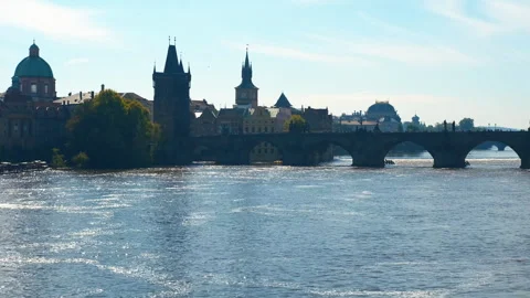Charles bridge in prague reflecting on river Stock Footage 310831712