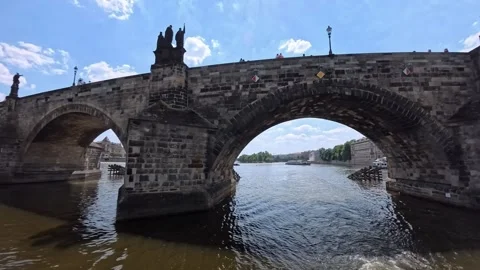 Charles Bridge Prague View from Boat Sailing Under Arch FP POV Stock Footage 341863678