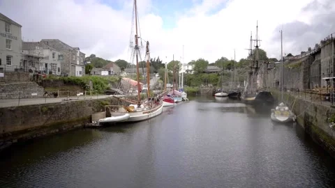 Charles town St Austell, Cornwall, England. Inner harbour with tall ships Stock Footage 134196191