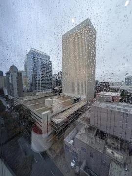 Charlotte Skyline Dissolving Softly Beyond Rain Covered Window Glass Downtown 스톡 사진