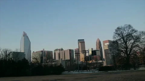 Charlotte skyline panorama at sunset with dynamic cloud motion and golden h.. Stock Footage 334703147
