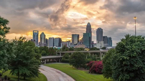 Charlotte sunset time lapse over bridge day to night 4k 1080p Stock Footage 77587041