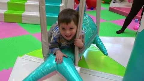 Charming boy in the children's playground Stock-Footage 73852426