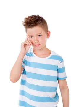 Charming boy thinking. Stock Photos