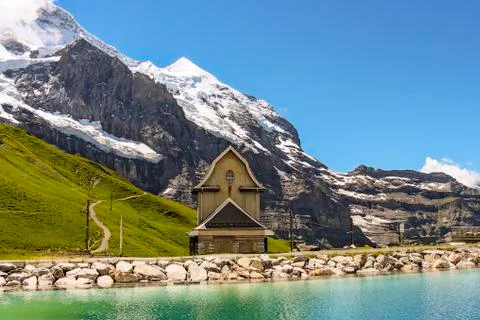 Charming Chilchli (tiny church) at Fallbodensee lake at Jungfrau Eiger Walk Stock Photos