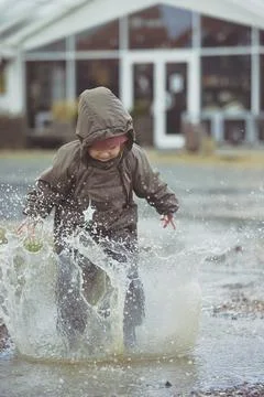 Charming child playing in Denmark Stock Photos